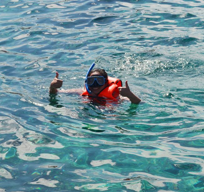 snorkeling near the waters of crocodile island
